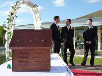 Peter & Kristy's had a Wooden Wedding Box Ceremony at their Wedding at Seaworld Resort Main Beach Gold Coast which included their parents and son Jayden. Peter built the house with Jayden in the shape of a house that had special significance to them.